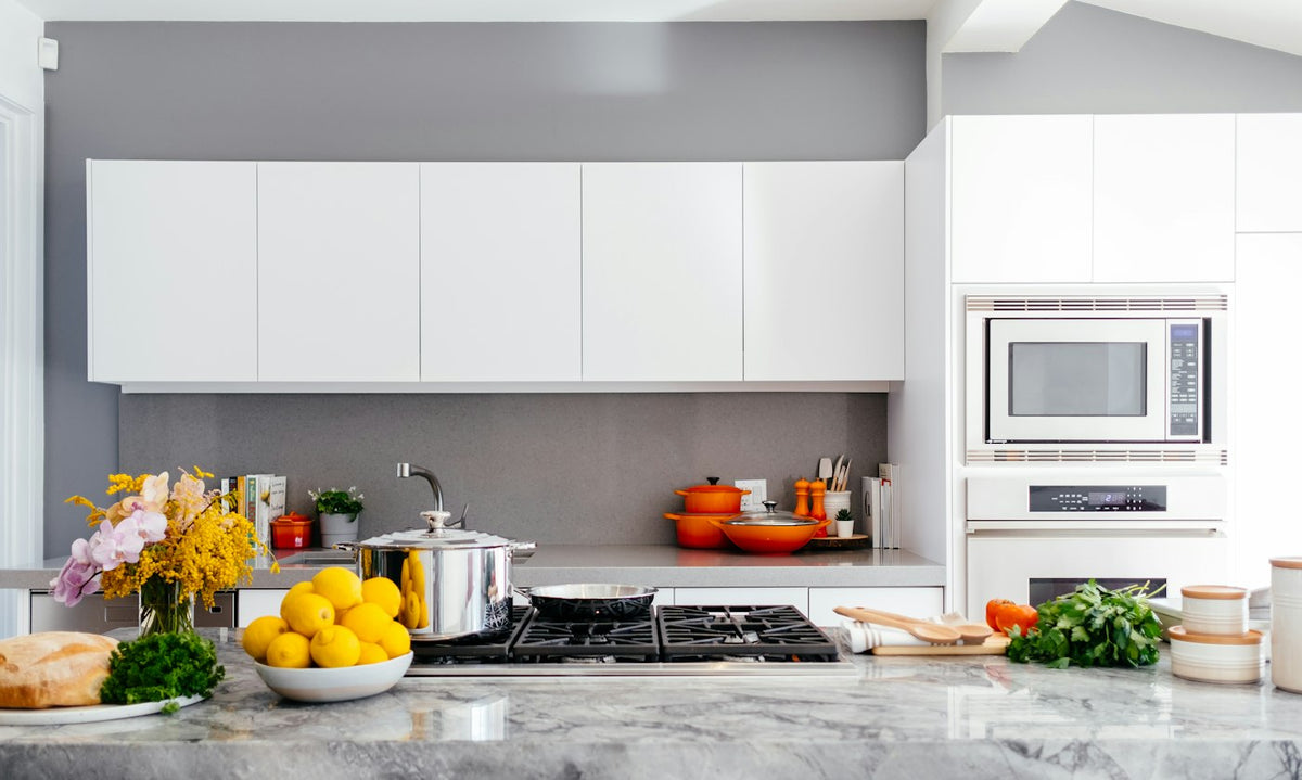 Kitchen range with pots and cookware